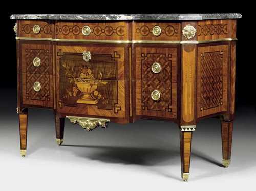 COMMODE "A FLEURS",Louis XVI, attributed to C.C. SAUNIER (Claude Charles Saunier, maitre 1752), Paris circa 1775/80. Tulipwood, rosewood and partly dyed precious woods in veneer and exceptionally finely inlaid with vases of flowers, wave band, fillets and frieze. Prism shaped chest with salient angles and tapering square cut legs. The centrally bombé front with 2 large sans traverse drawers and 3 laterally arranged smaller drawers. Matte and polished gilt bronze mounts and sabots. With old inventory number in ink. Restored. 148x60x95 cm. Provenance: from a German collection