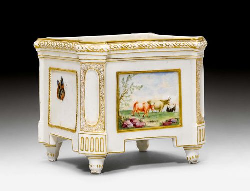 BOUQUETIÈRE,Nyon, ca. 1781-1813. Square with pilaster-shaped edges and retracted feet. Painted with a landscape vignette. Accentuated in gold. H 12 cm. Insert broken. Provenance: Private collection, Geneva.