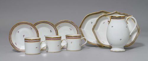 PIECES OF A COFFEE SET,Nyon, ca. 1781-1813. Painted with a braided border on a purple ground, with flowers. Comprising: 1 coffee pot (cover missing), 2 saucers, 3 cups with saucers. Underglaze blue fish marks. Gilding, partly rubbed. Provenance: Private collection, Geneva.
