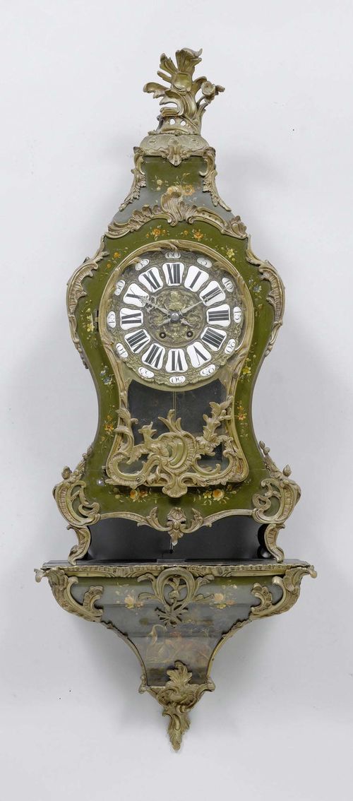 A PAINTED CLOCK ON PLINTH, Louis XV style, France circa 1900. Green painted wooden case with floral decoration. Bronze dial with relief decoration and white enamel cartouches. Movement with anchor escapement striking the 1/2 hours on gong. H 114 cm. Requires servicing.
