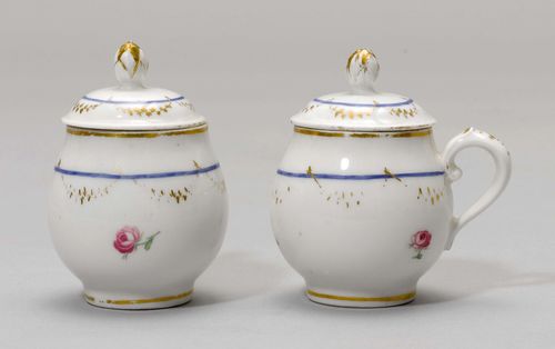 LOT OF 3 'POTS DE CREME',Nyon, ca. 1781-1813. 2 with a blue line border and gold festoons, one similarly painted with a flower garland. Underglaze blue fish marks. H 8 cm. Gilding rubbed, 1 finial broken, requires restoration. Provenance: Private collection, Geneva.
