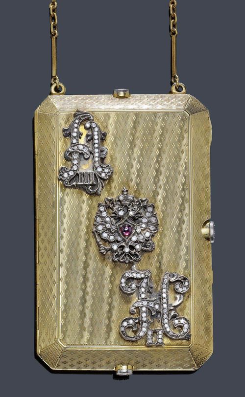 A GOLD AND DIAMOND NECESSAIRE DE SOIR, St. Petersburg 1899-1908. Yellow gold 56 Zolotniki, 89g. Elegant quadrangular textured case. The top with two monograms: A III for Czar Alexander III, N II for Czar Nicholas II,  with the Russian double-headed eagle, all in silver and set with rose-cut diamonds.  Opening to reveal two compartments with two hinged panels and 1 hinged mirror frame. The mirror missing. The three pushpieces set each with 1 single-cut diamond. Suspended on a fancy chain with end ring.