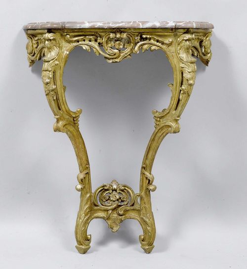 A SMALL CARVED GILTWOOD CONSOLE, Régence, France, 18th century. Red/grey mottled marble top (repaired). 67x35x84 cm.