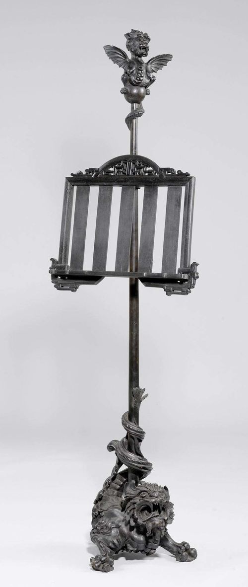 A CARVED AND BLACKENED WOOD MUSIC STAND, Napoléon III, France, signed LARDOT. H 186 cm.