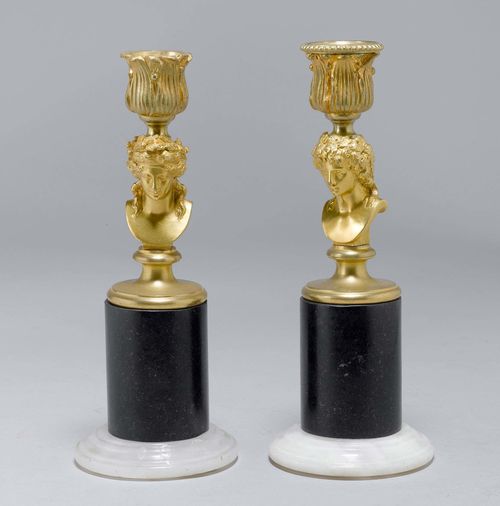 PAIR OF SMALL CANDLESTICKS,Napoleon III. Gilt bronze. Cylindrical shaft with bust of Diana, blossom-shaped nozzle. H 22 cm.