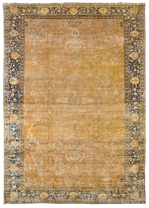 KESHAN MOHTASCHEM palace carpet, antique. Dusky pink central field finely patterned with plant motifs in delicate shades of light blue and yellow. Blue border with flowers and palmettes in pink and yellow. Slight wear in parts, otherwise in good condition. 405x715 cm.