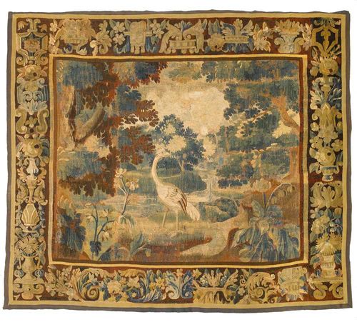 VERDURE TAPESTRY,Louis XV, probably  France, 18th century Depicting a heron in an idealised forest landscape. Fine floral and foliate border. H 165 cm, W 202 cm. Provenance: Private collection, Bern.