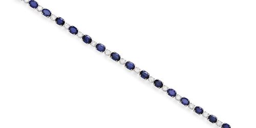 SAPPHIRE AND DIAMOND BRACELET, GÜBELIN, ca. 1970. White gold 750. Classic bracelet, set with 19 oval, fine sapphires weighing 12.17 ct in total and 19 brilliant-cut diamonds weighing ca. 2.45 ct in total. L ca. 17.5 cm. With copy of insurance estimate, January 1976.