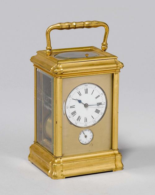 TRAVEL ALARM CLOCK, France, middle of the 19th century. Gilt brass. Rectangular case with handle, glazed on all sides. Brass front with white enamel dial and small alarm dial. Movement with balance, striking mechanism can be switched between Grande Sonnerie, Petite Sonnerie and Silent mode, on 2 gongs. Alarm on gong. 10x9x15 cm. Movement requires revision. 1 key.