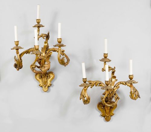 SET OF  4 SCONCES,late Baroque, Italy, 19th century. Carved wood and gilt stucco, with 4 curved light branches. Fitted for electricity. 50x68 cm.