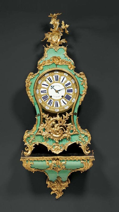 GREEN HORN CLOCK with plinth,Louis XV, the dial and movement signed POULAIN A SAINT DENIS, Paris circa 1745. Green horn inlaid with brass fillets. Bronze dial with 24 enamel cartouches. Fine brass movement striking the 1/2 hours on bell. Exceptionally rich, matte and polished gilt bronze mounts and applications. 48x25x125 cm. Very good condition.