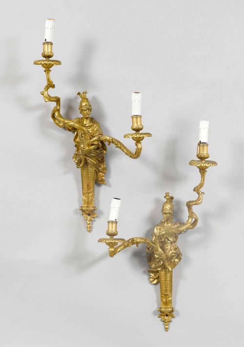 PAIR OF IMPORTANT SCONCES "MINERVE ET MARS",in the Régence style, France. Gilt bronze. Wall plate designed as Minerva and Mars, holding 2 light branches with vase-shaped nozzles and round drip pan. H 59 cm.