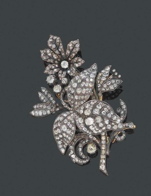 DIAMOND BROOCH, ca. 1850. Silver over yellow gold. Attractive, elegant brooch in the shape of a flower branch, the leaves and blossoms entirely set with ca. 343 old-mine-cut diamonds and rose-cut diamonds totalling ca. 10.00 ct. Removable clasp.