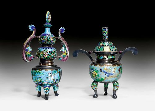 TWO ENAMELED SILVER INCENSE BURNERS WITH POLYCHROME DESIGNS OF BIRDS, FLOWERS AND LEAVES WITH OPENWORK COVERS. China, ca. 1900, Height 34 and 42.5 cm. A dent.