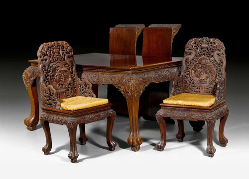 EIGHT HARDWOOD CHAIRS AND TABLE WITH RICH OPENWORK CARVING OF DRAGONS AND FIGURATIVE SCENES. 108x55x47 cm (chairs), 82x115x166.5 cm (table). (9)
