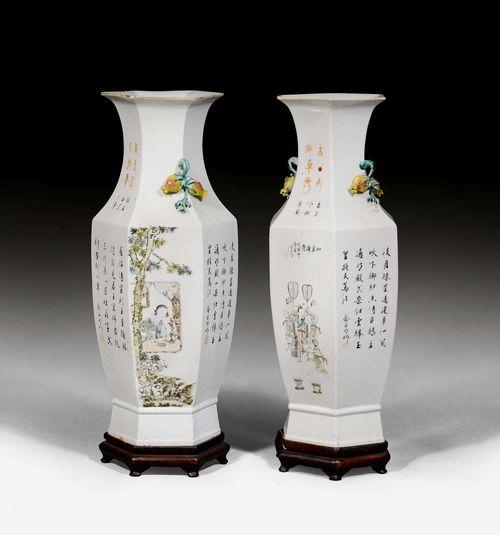 A PAIR OF LARGE FAMILLE ROSE BALUSTER VASES WITH SMALL FRUIT-SHAPED HANDLES AND FIGURATIVE SCENES ALTERNATING WITH CALLIGRAPHY. China, Republic, Height 60.5 cm. Wooden bases. Minor damage. (2)
