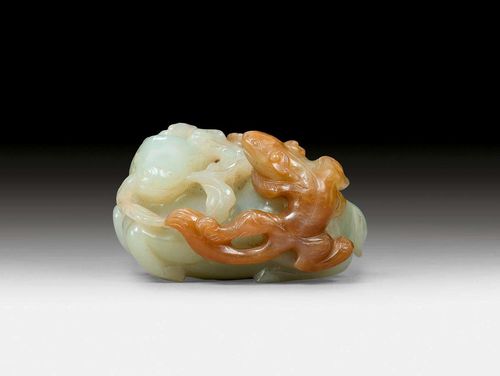 A CELADON AND BROWN JADE CARVING OF A DEER AND A SQUIRREL. China, 18th ct. Length  6.5 cm.