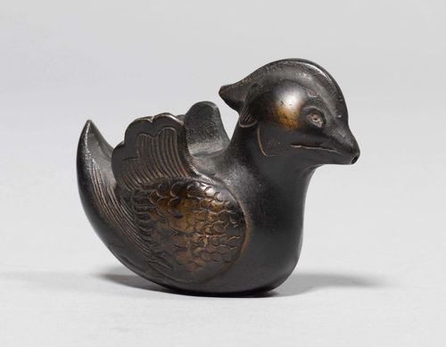 A BRONZE WATER DROPPER (SUITEKI) IN THE FORM OF A DUCKLING WITH INCISED FOLIAGE. Japan, Edo period, length l8 cm.