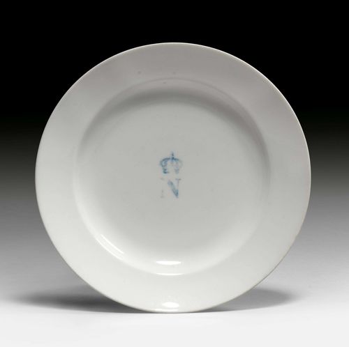 FROM THE DE AMODIO COLLECTION: PLATES FROM A DINING SERVICE FOR NAPOLEON BONAPARTE,Paris, 19th century. White with the Imperial crown over a blue monogram N. D 22.3 cm. Provenance: - from the Palace of Fontainebleau. - from the collection of the Marquis and the  Marquise de Amodio y Moya, Hôtel particulier, 93 rue de l'Université, Paris (formerly La Rochefoucauld).