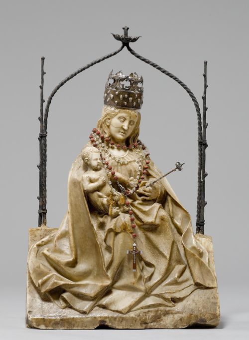 MADONNA AND CHILD,late Gothic, Burgundy, 15th century. Soapstone. Mary in a cloak sitting on a throne featuring a portal-shaped, iron top (later), carrying the Infant Jesus in her right arm. H 37 cm. Head restored and repaired. Head of the child, later. Crown, later. H 37 cm.
