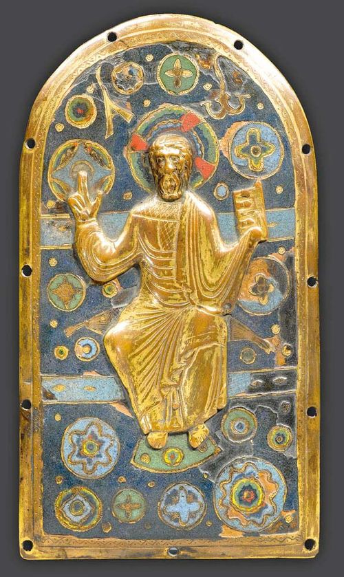 MAJESTAS DOMINI,Limoges, beginning of the 13th century. Finely engraved bronze plaque with champlev&#233; enamel and embossed and gilt copper. With an applied, embossed and gilt copper figure of Christ enthroned. 24.5x13.5 cm. Some losses.