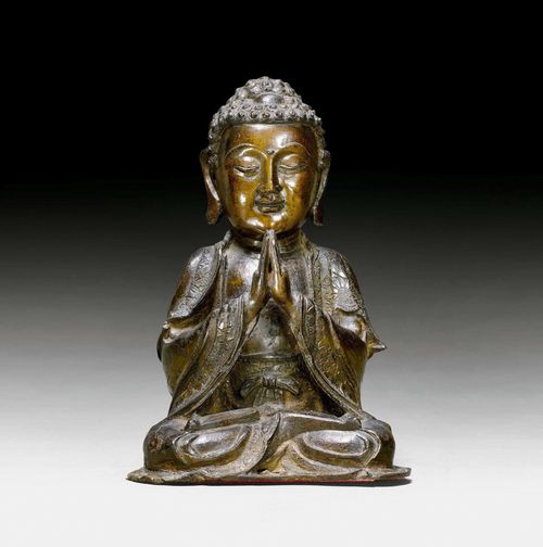 A DARK PATINATED BRONZE FIGURE OF BUDDHA SEATED. 17th c. Height 20.5 cm.