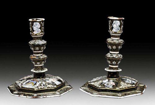 PAIR OF ENAMELLED CANDLE HOLDERS, Renaissance style, probably Limoges, 19th century Polychrome enameled copper, with finely painted figures from Roman mythology on a black ground. H 15 cm. Provenance: from an important European collection.