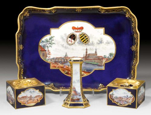 INKSTAND WITH ELBE VIEWS, Meissen, circa 1775-1815.Reserves with various Elbe castles and view of Dresden with the Electoral Saxonian coat of arms. Consisting of: a bowl, a sand box, an inkwell with lid and a pen holder. Underglaze blue sword marks with star and I. L 29cm.