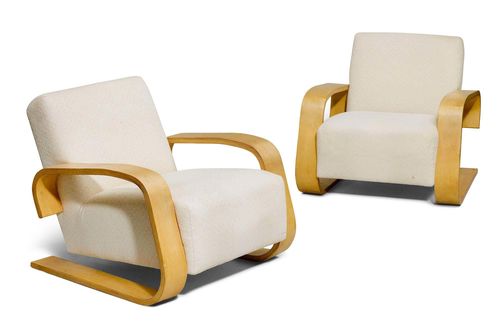 ALVAR AALTO (1898 - 1976) PAIR OF ARMCHAIRS, Model "37-400" (Tank), 1936/37 design for Artek Birch with white fabric covers. The covers in need of replacement.