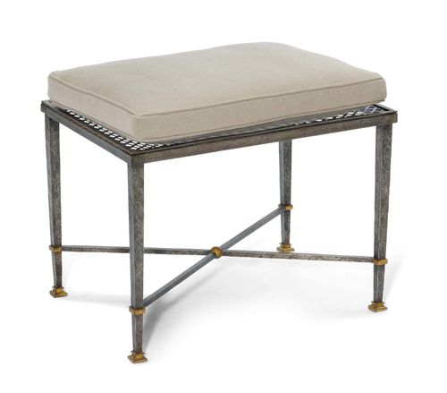 GILBERT POILLERAT (1902 - 1988) STOOL, 1950s Parcel gilt and perforated wrought iron, with grey fabric cover.