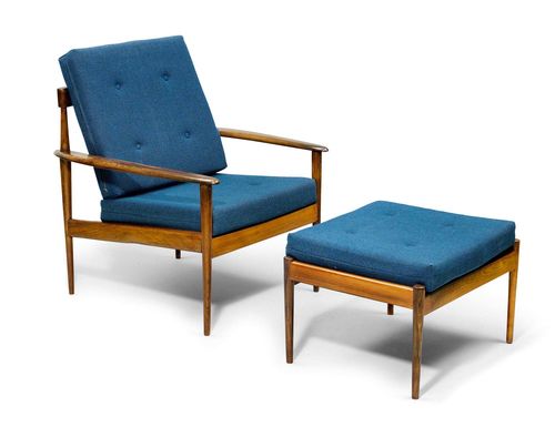 BRAZILIAN LOUNGE CHAIR WITH OTTOMAN, circa 1960 Rosewood with blue fabric cover. Bands replaced, with remains of a label.