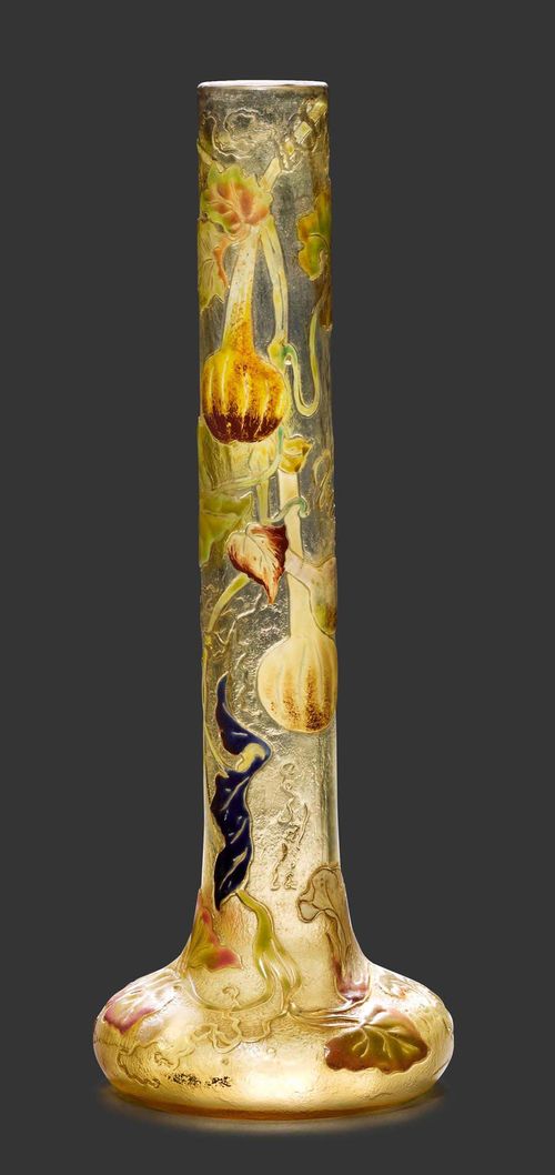 EMILE GALLE VASE, circa 1900 Yellow glass with etching and enamelling. Decorated with pumpkin motif. Signed Gallé. H. 34.5 cm.