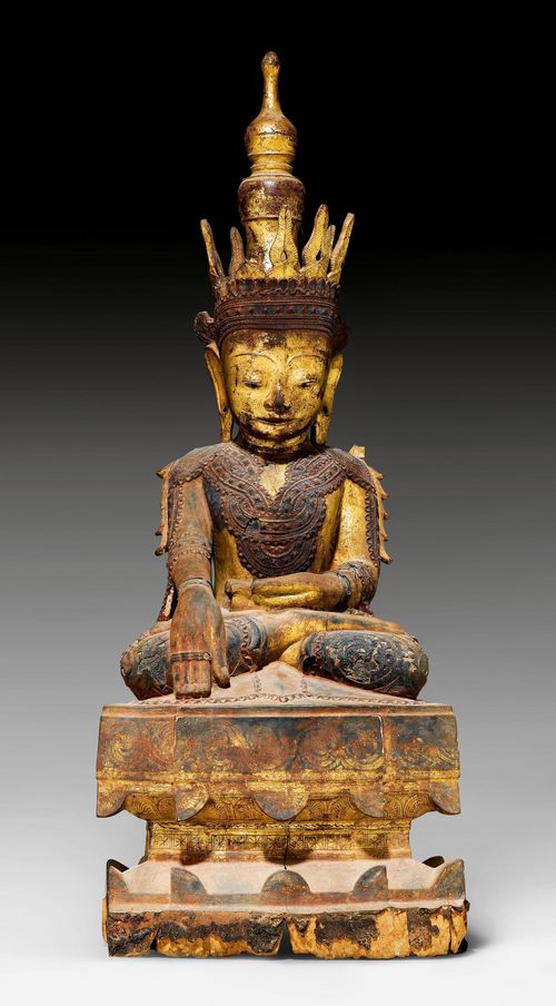 A LACQUER PAINTED WOODEN FIGURE OF A BUDDHA ON A THRONE, WITH A MAGNIFICENT ROBE AND A REMOVABLE KETUMALA. Burma, 19th c. Height 91 cm. Gold over red lacquer. Somewhat damaged.