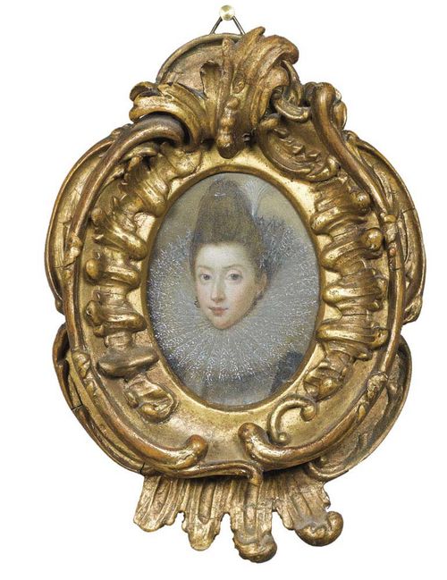 England circa 1600. Oil on copper. Portrait of Katherine de Rochefort, wife of Sir Thomas De La Feld, the oldest relative of Wilhelm Lord Fitzwarine.  6.3x4.8 cm. In oval carved wooden frame with foliate decoration. .