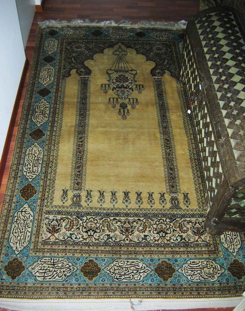 GHOM silk prayer rug. Yellow Mihrab with large lantern and green spandrels, turquoise border with inscriptions. Good condition. 231x137 cm.