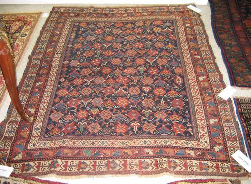 AFSHAR old. Blue central field with stylised flowers, triple stepped border. Considerable wear, 155x125 cm.