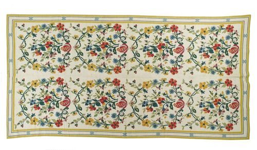 AUBUSSON "Petit-point" carpet, old. Beige central field in two joined rows, patterned throughout with flowers and garlands, narrow border. Good condition. 335x170 cm.