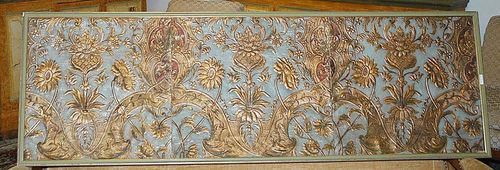 PART OF A PAINTED LEATHER WALL COVERING, so-called "cuir de Cordoue", Spain circa 1700. Embossed and painted leather with grotesques, flowers, scrolls and rocaille. 4 non-matching panels fitted together. 1 framed. 157x50 cm, 150x53 cm, 184x72 cm, 184x72 cm. Provenance: from a German collection