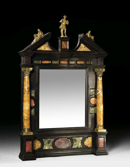 SMALL "TABERNACKLE" MIRROR, Renaissance, Florence circa 1600. Moulded and ebonised wood and finely inlaid with various kinds of marble and semi-precious stones. With lateral marble columns with bronze capitals, pierced cornice and central bronze figure between 2 female figures. With later mirror plate. H 49 cm, W 30 cm. Provenance: Private collection, Basel. A very important and high quality mirror