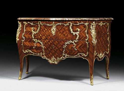 IMPORTANT ROYAL CHEST OF DRAWES, Louis XV, sign. M. CRIAERD (Mathieu Criaerd, maitre 1730), the bronzes with "c couronné", with inventory stamp from CHATEAU DE MARLY, Paris circa 1745/50. Satinwood and amaranth veneer also finely inlaid with lozenge and diamond patterns. The centrally bombé front with 2 sans traverse drawers. With exceptionally fine matte and polished gilt bronze mounts and sabots, some replaced, and a richly shaped "Griotte Rouge"-top. 133x60x84 cm. Provenance: - formerly in the Royal collection at Château de Marly, France. - from a French collection.