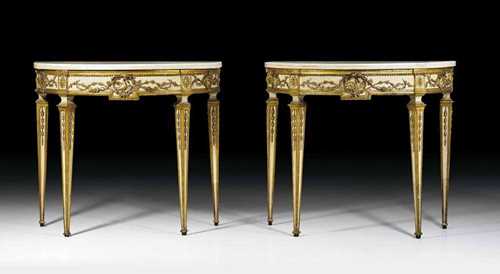PAIR OF PAINTED DEMI-LUNE CONSOLES "AUX TETES DE LIONS", Louis XVI, G.M. attributed to BONZANIGO (Giuseppe Maria Bonzanigo, 1745 Turin 1820) Turin circa 1780. Very finely carved wood, painted beige and parcel gilt. With "Carrara" top.  107x54x93 cm. Provenance: private collection, West Switzerland
