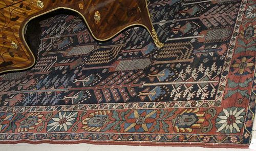 BACHTIARI old. Dark central field patterned with stylised trees of life, red border with stylised flowers, good condition, 310x230 cm.