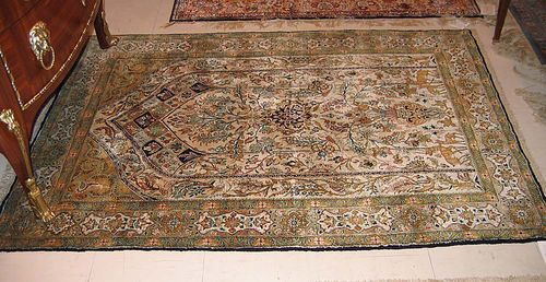 GHOM silk, prayer rug. White Mihrab, lavishly decorated with plants and animals, green border, good condition, 160x111 cm.