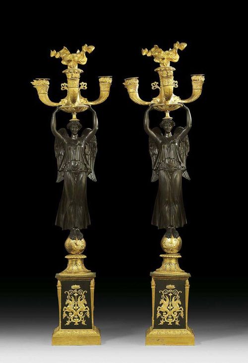 PAIR OF IMPORTANT BRONZE CANDELABRAS "AUX VICTOIRES", Empire, the model probably by C. GALLE (Claude Galle, maitre 1786), Paris circa 1810. Matte and polished gilt bronze and burnished bronze. With victory figure on sphere bearing a bowl with torches and 3 light branches. 1 light branch repaired. H 90 cm. Provenance: - private collection, Central Switzerland. - Galerie Koller auction 15.6.2004 (lot  1191). - from an English collection