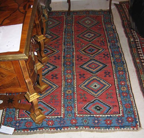 KAZAK old. Red central field in two rows, divided with rhombus shaped medallions, blue border, good condition, 200x125 cm.