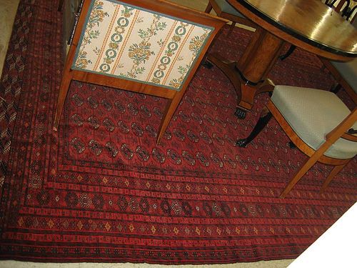 TEKKE BOCHARA, old. Attractive, very finely knotted piece. Red ground with 9 rows of guls, stepped border, good condition, 375x260 cm.