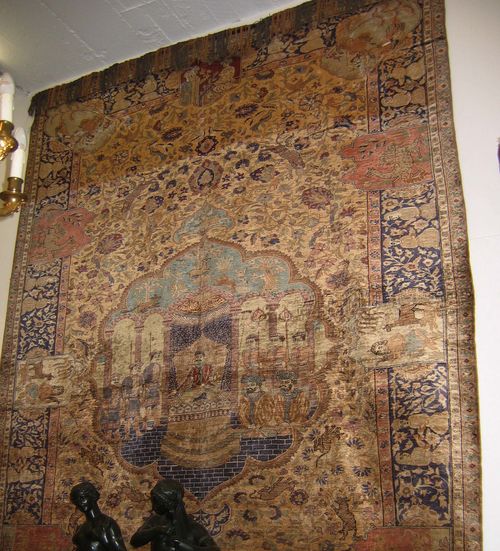 ANATOLIAN SILK, antique. Yellow central field finely decorated with flowers and animals. The central medallion depicts a scene with a ruler and his entourage. The border is blue and shows human figures, good condition, 290x200 cm.