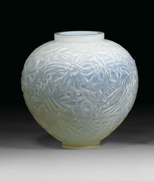 VASE "Gui", R. Lalique, ca. 1930. White glass with blue iridescence, decorated with  mistletoe, signed R. Lalique France, 16.5 cm.