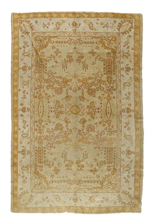 OUSHAK antique. Yellow central field with stylized plant motifs in light pastel colours, beige border, signs of wear, 300x200 cm