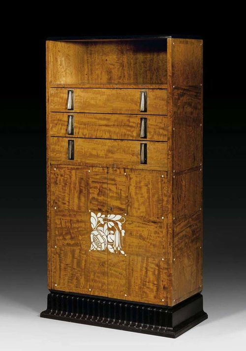 CHIFFONNIER, Mercier Frères Paris, ca. 1920. Sapele veneer. With shaped and ebonised cornice on ebonised and fluted plinth. With two-door front inlaid with ivory flowers, with drawers and large compartment. Silver plated mounts. 76x36x145 cm.